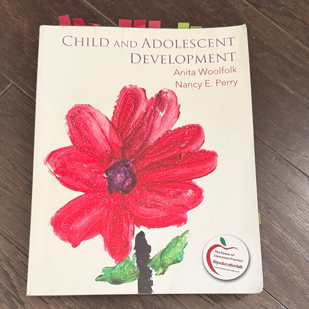 Child and Adolescent Development Textbook with Red Flower Cover